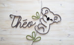 Koala sur branche en tricotin